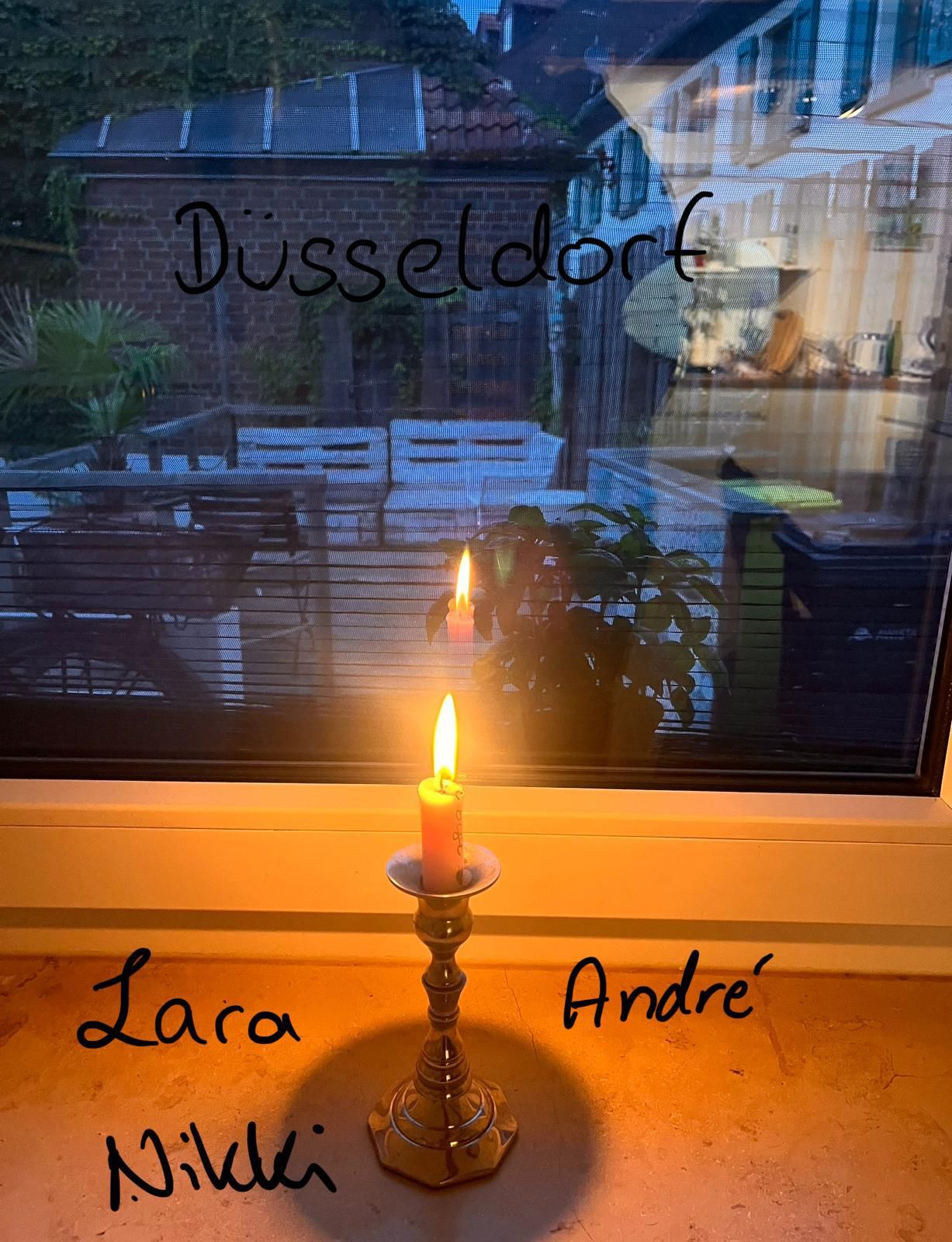 Candle lit by Lara, Andre, Nikki
